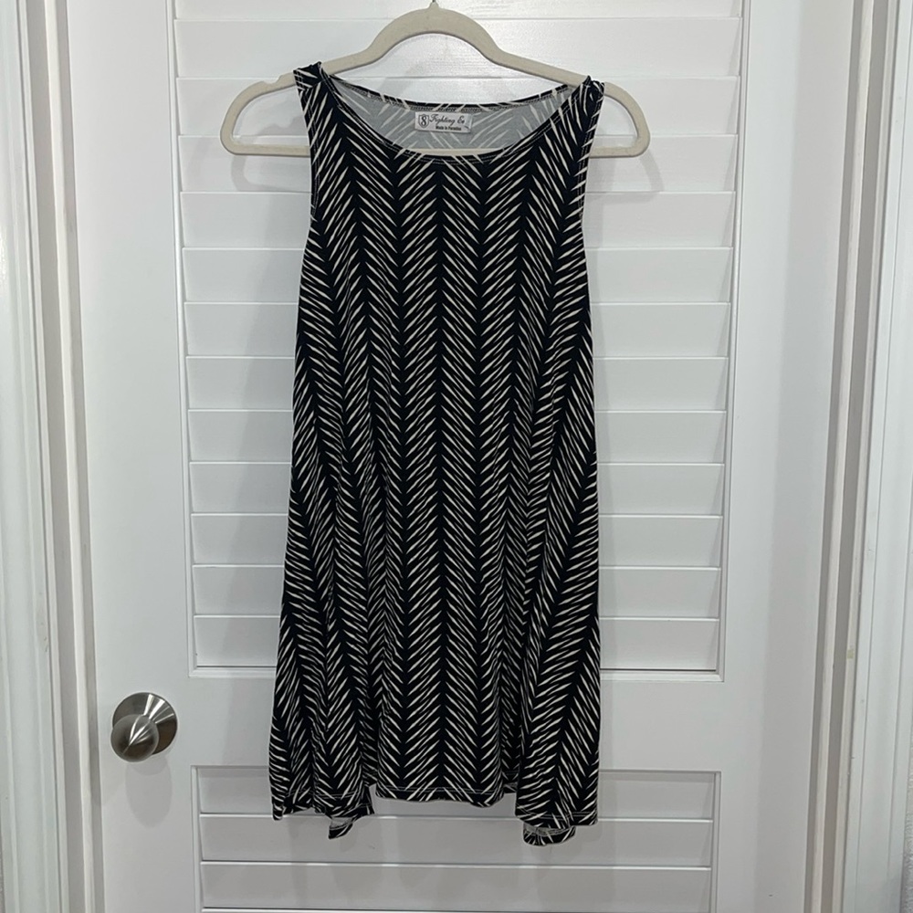 Fighting eel sleeveless knit dress in black/white pattern. Near vintage